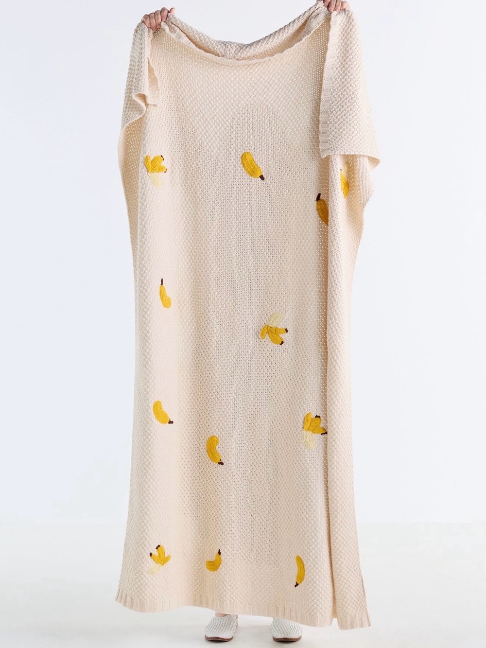 Isabella Cotton Knit Icon Banana Throw Blanket from Anthropologie